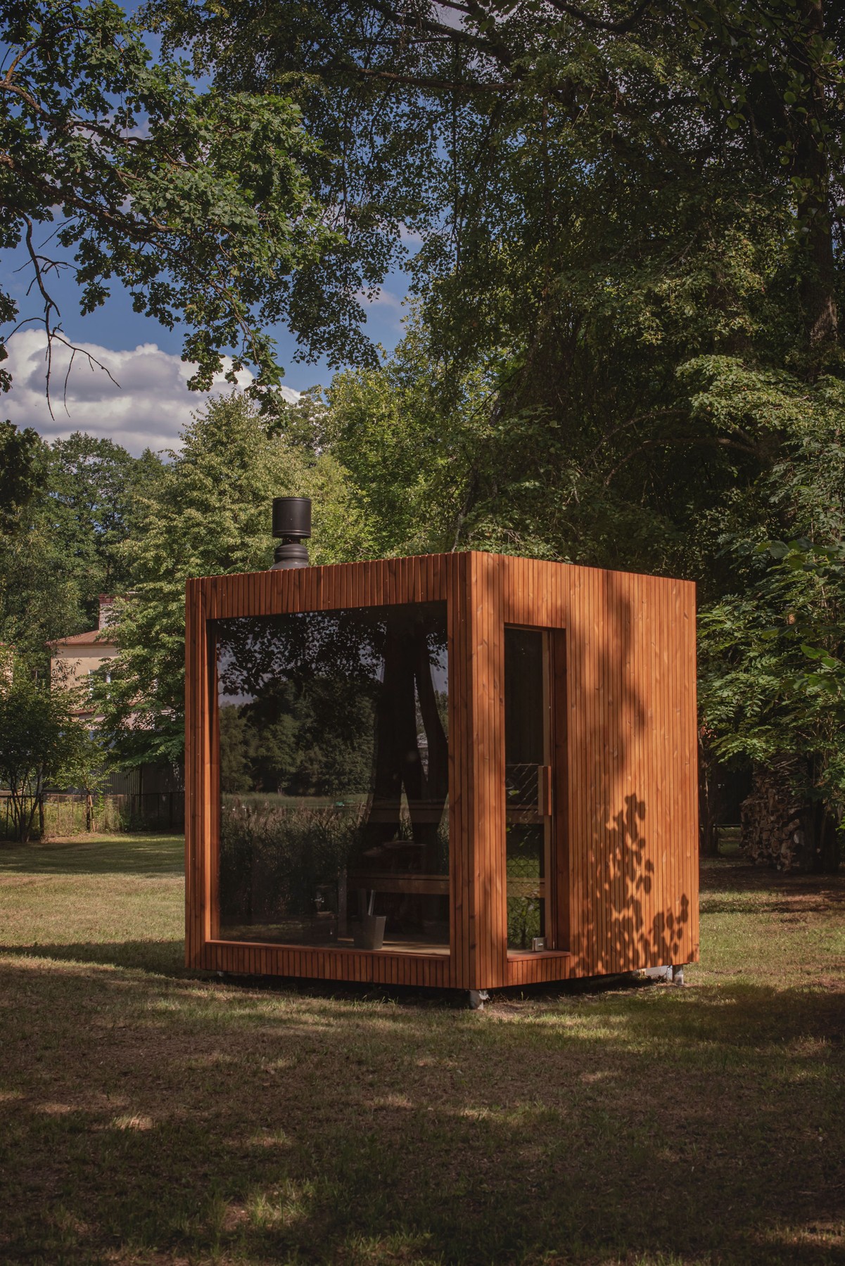 Giby Inari sauna with thermo pine exterior and panoramic glass